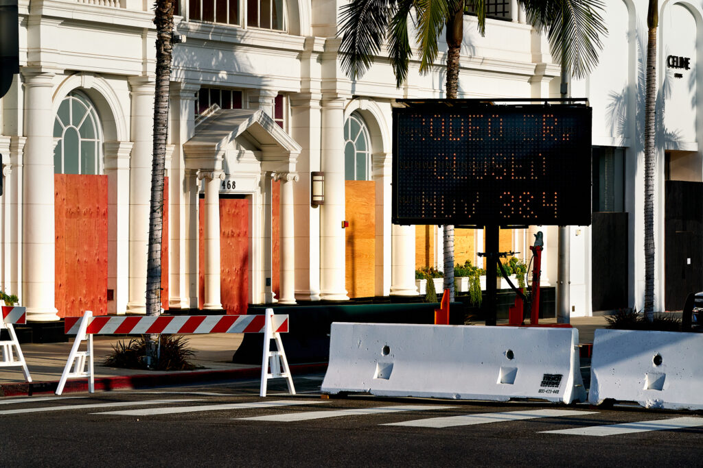 Rodeo Drive Boarded Storfronts. 2020 Presidential Election, election, presidental election, protest, protests, retail, riots, storefronts, urban, urban city, street closure, police barricades.