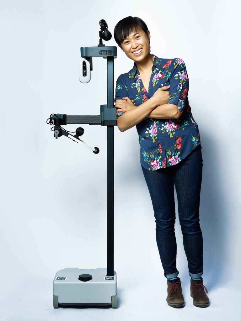 Vy Nguyen with Stretch RE1 Robot. Stretch RE1, caregiver, disability, research, robot, robotics.