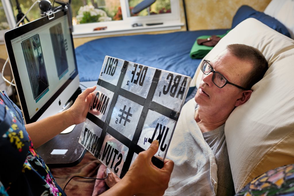 Using The Letter Board. Stretch RE1, caregiver, disability, research, robot, robotics.