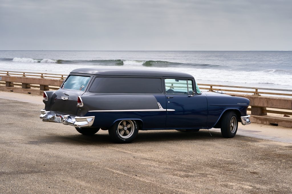 Chevy Wagon. automotive, beach, beach umbrella, americana, vehicle, vintage, vintage car, classic car, chevy, chevrolet.