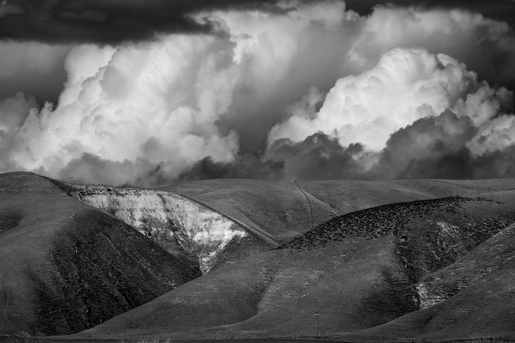 Wind Turbine. hills, clouds.