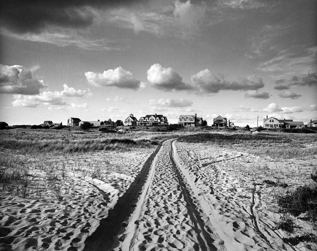 Surfside Beach Houses. beach, houses, road, sky, clouds, dunes, landscape.