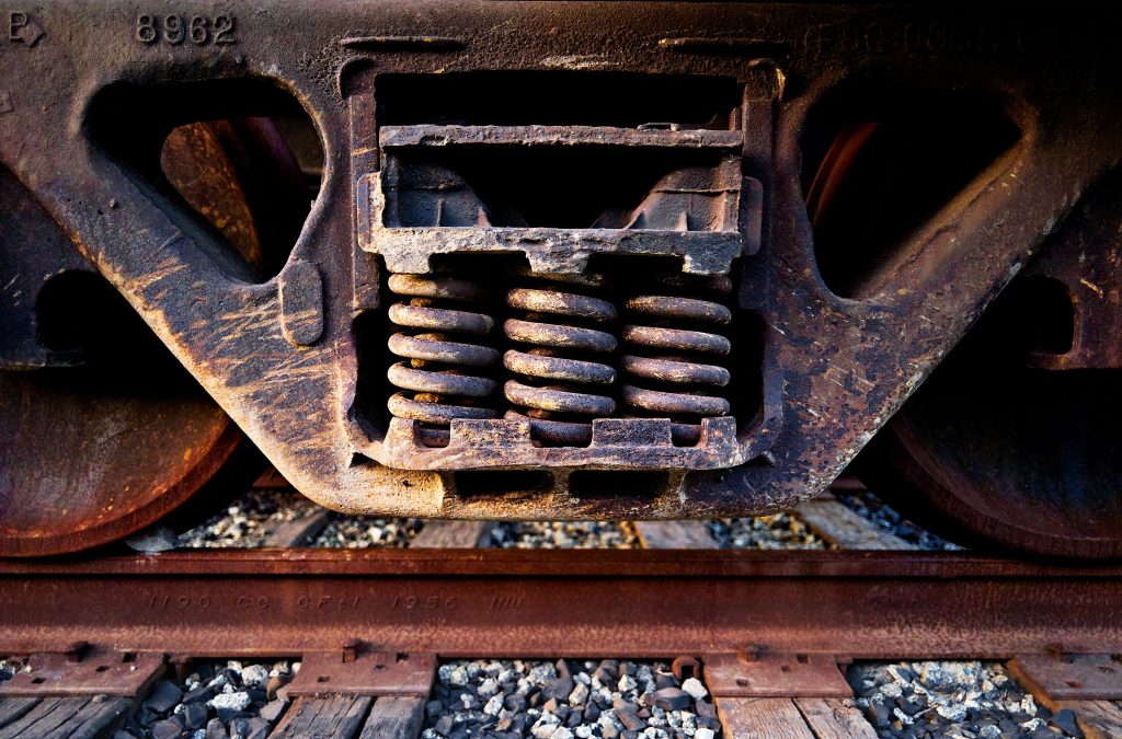 Suspension Coils. suspension, springs, industrial, train, train tracks, rust.