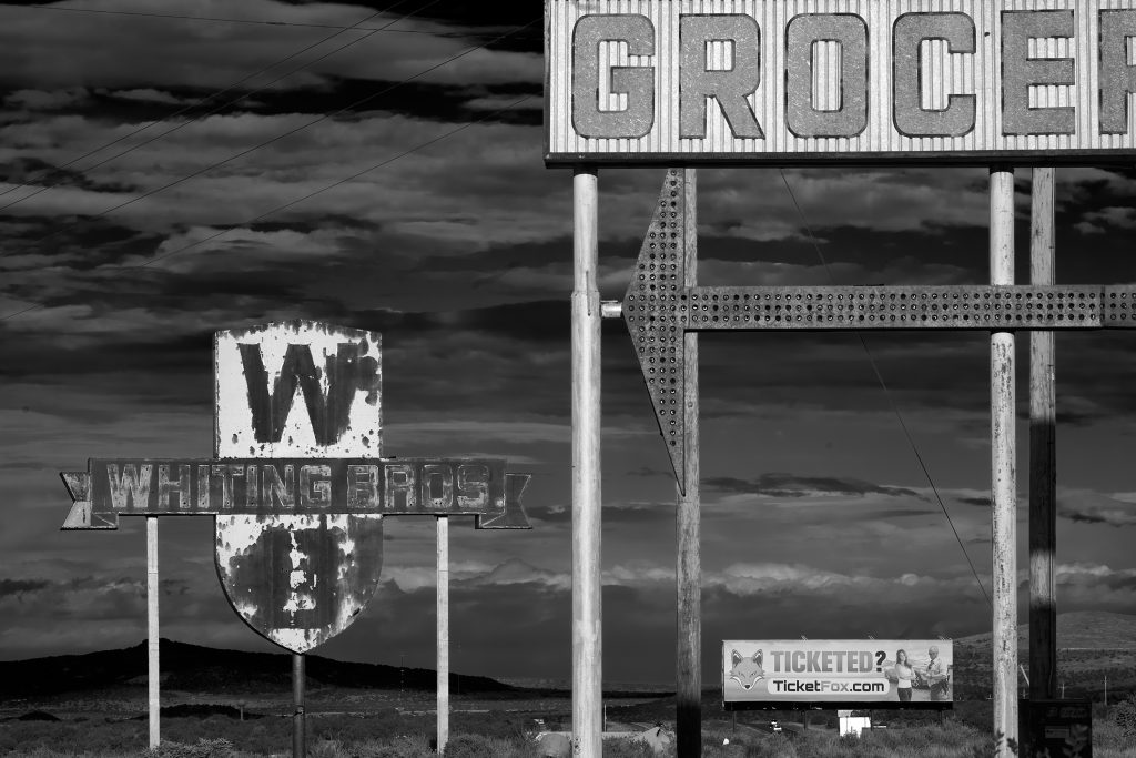 Whiting Brothers Sign. abandoned, clouds, cloudscape, americana, landscape, groceries, motel, Whiting Brothers, route 66, service station, sign.