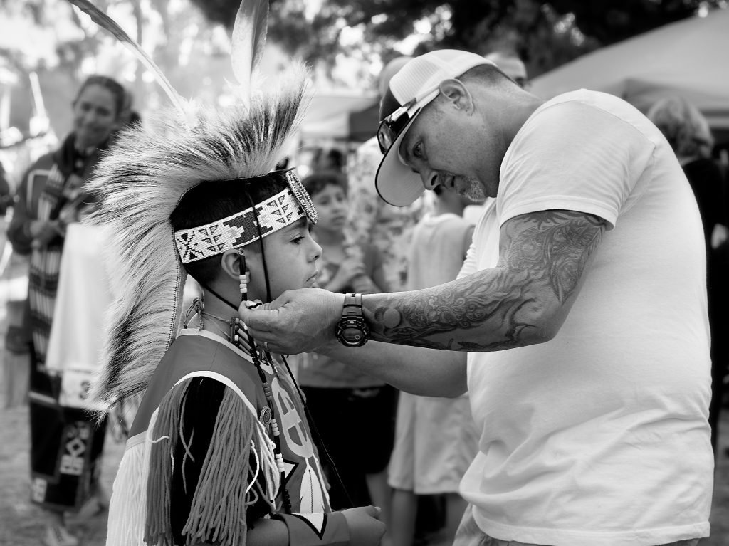 Powwow Dancer. reportage, native american, tradition, generational, child, ceremony.